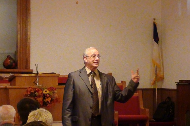 Pastor Hall Illustrating During a Sermon